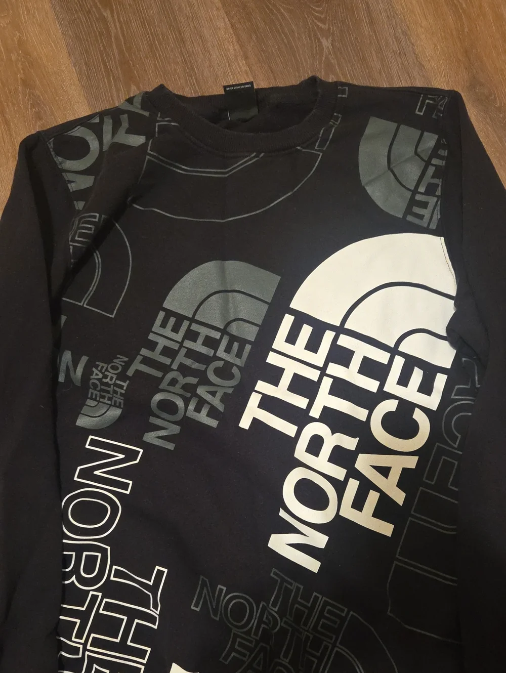 The North Face Men’s Black Crewneck Sweatshirt with White & Gray Logo Print